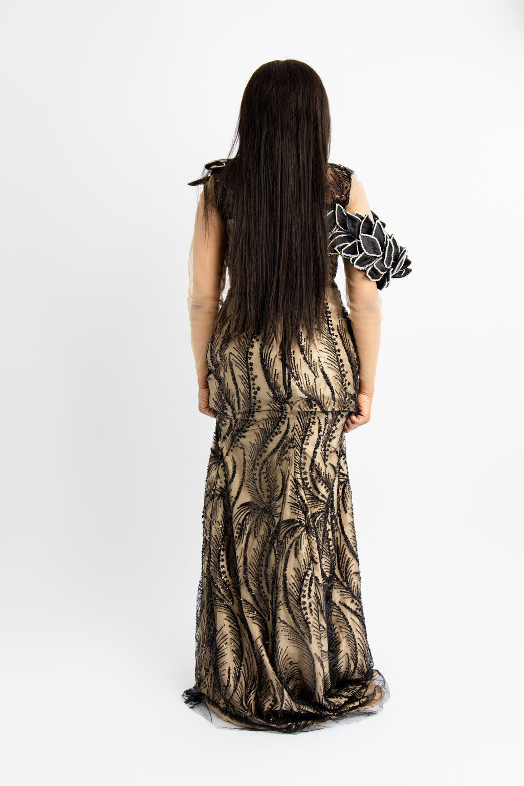 Elegant Black Sequin Mermaid Gown with Nude Mesh Sleeves