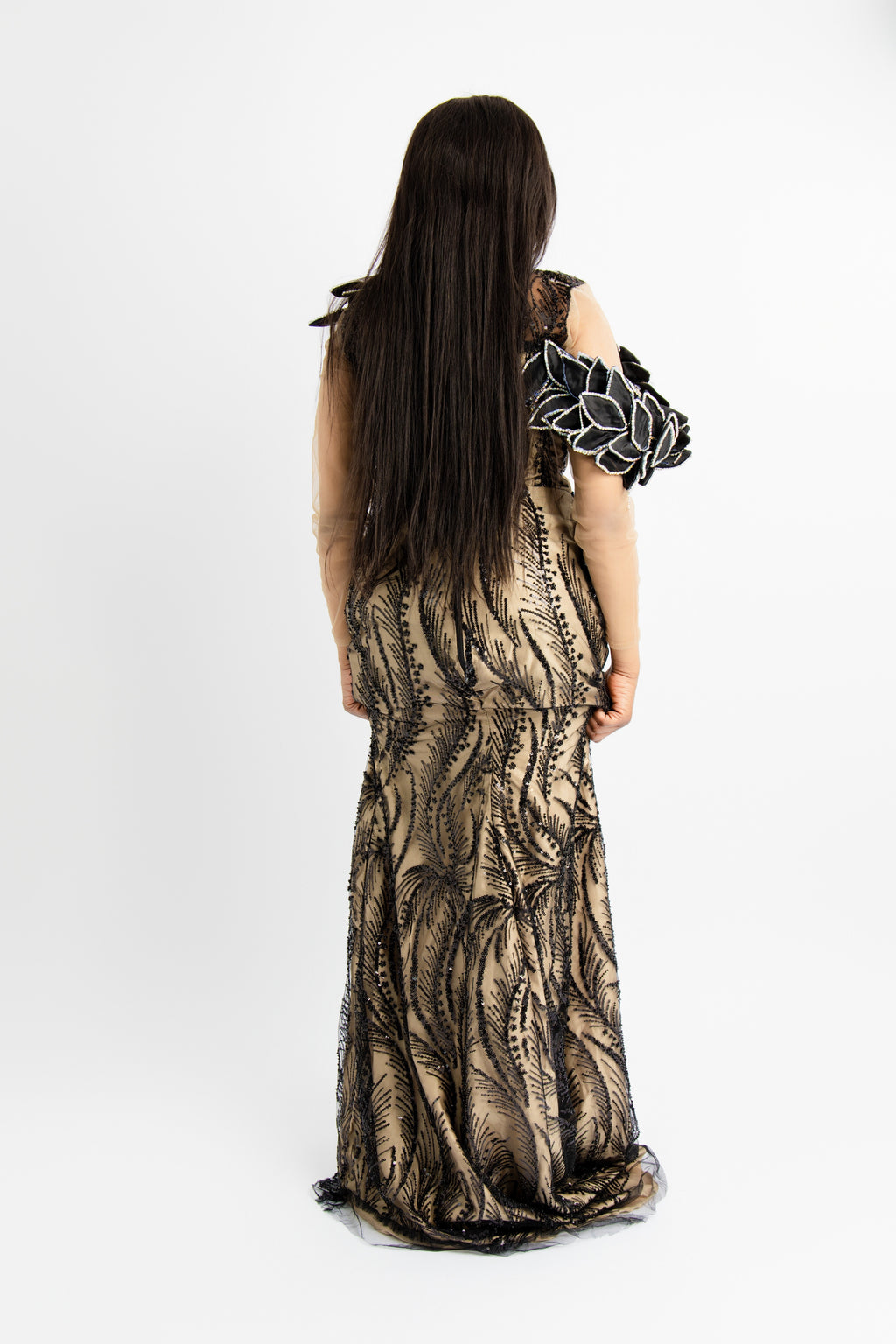 Elegant Black Sequin Mermaid Gown with Nude Mesh Sleeves