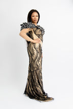 Elegant Black Sequin Mermaid Gown with Nude Mesh Sleeves