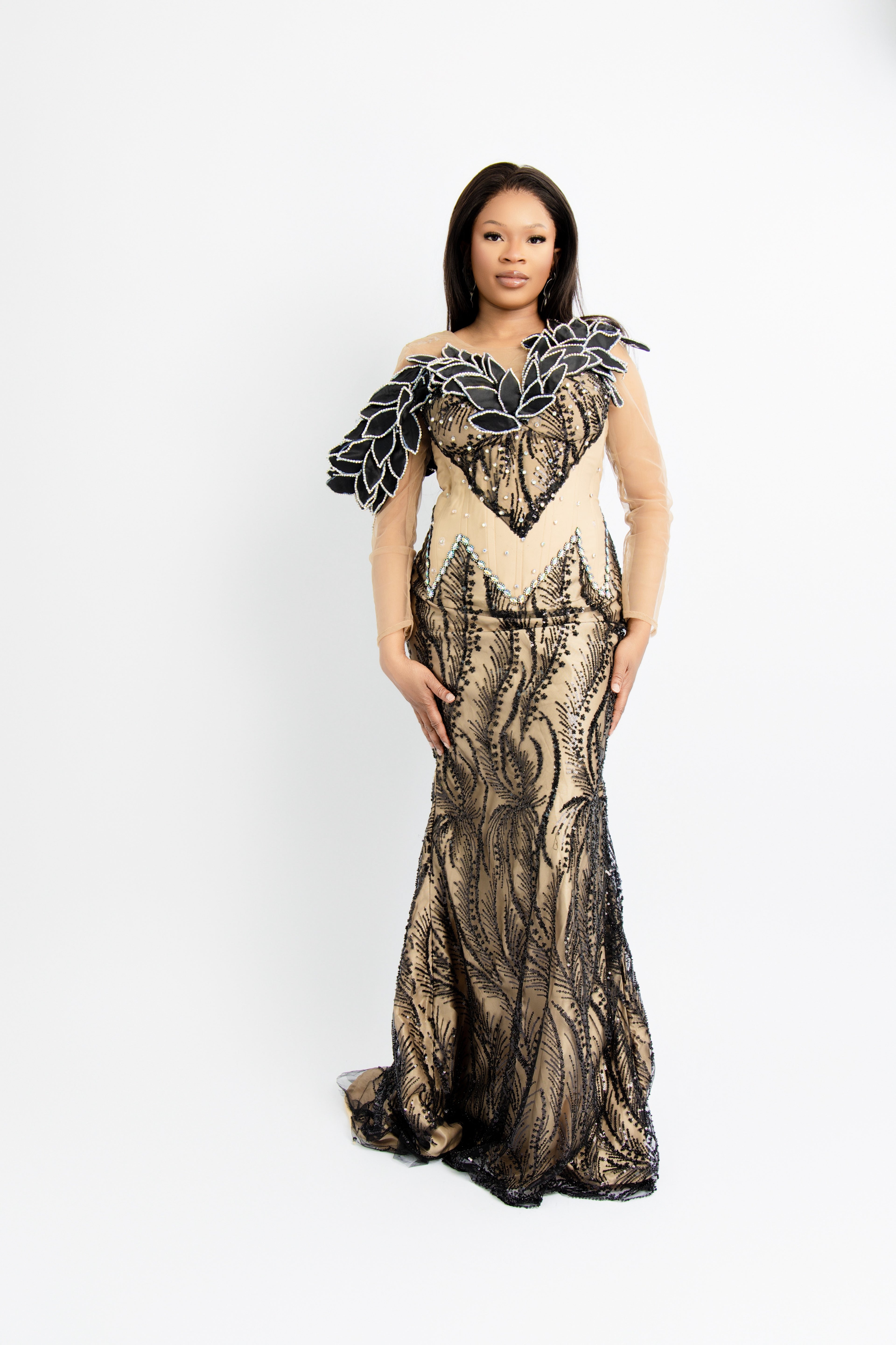 Elegant Black Sequin Mermaid Gown with Nude Mesh Sleeves